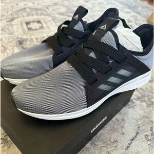 Adidas brand, never worn! Women’s size 8.5.